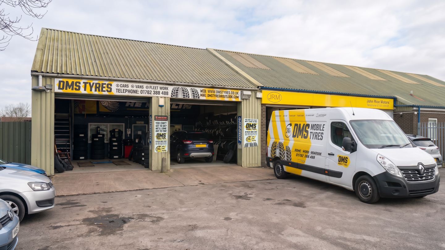 DMS Mobile Tyres van outside the DMS Tyres garage